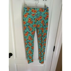 LuLaRoe one size Leggings teal with yellow daisy/sunflowers